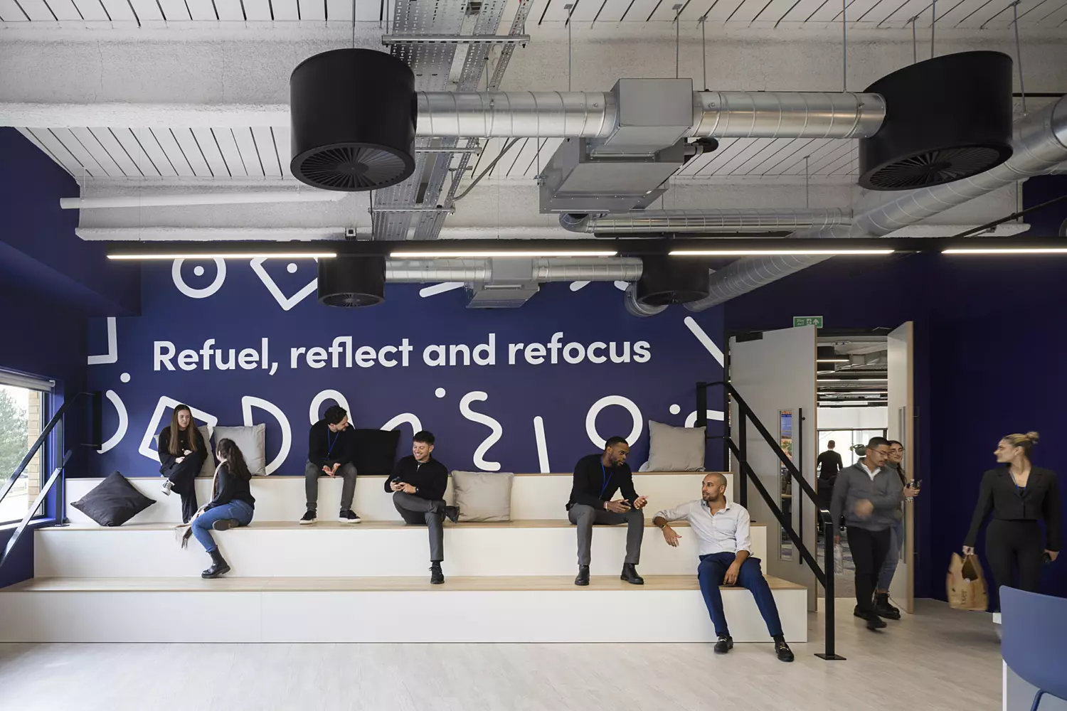 Communal space with bleacher seating at Bionic