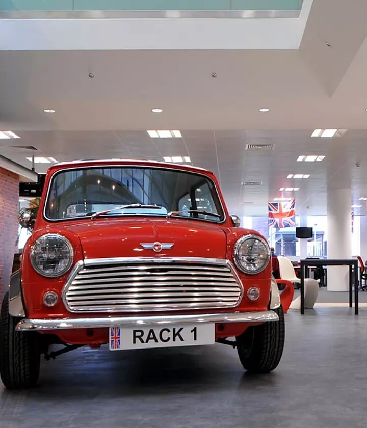 Fun office design with a Mini in the open plan office