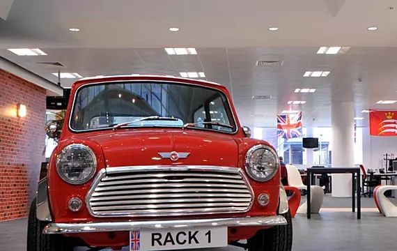 Fun office design with a Mini in the open plan office